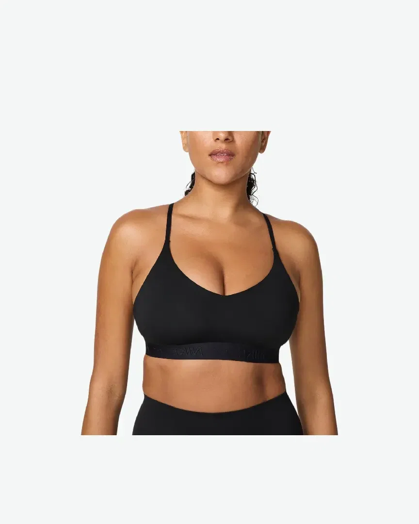 Sostén ajustable acolchado de sujeción ligera Nike Indy Mujer