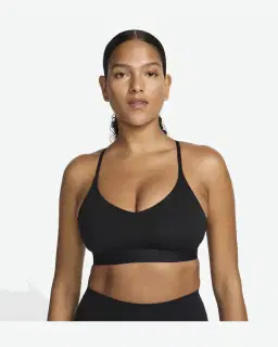 Sostén ajustable acolchado de sujeción ligera Nike Indy Mujer – 1/4