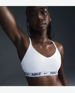 Sostén ajustable acolchado de sujeción ligera Nike Indy Mujer – 1/4