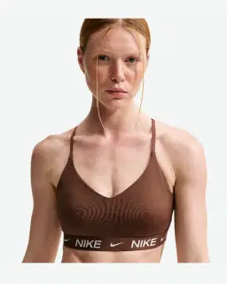 Sostén ajustable acolchado de sujeción ligera Nike Indy Mujer – 1/4