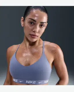 Sostén ajustable acolchado de sujeción ligera Nike Indy Mujer – 1/4