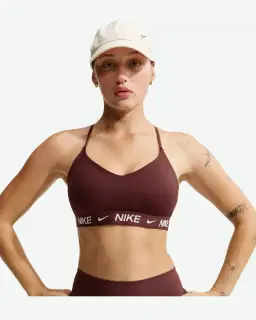 Sostén ajustable acolchado de sujeción ligera Nike Indy Mujer – 1/4