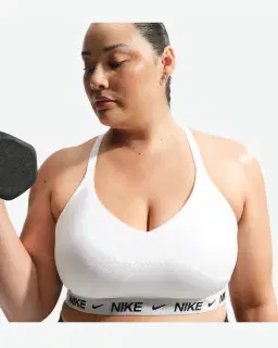 Sostén ajustable acolchado de sujeción ligera Nike Indy Mujer – 1/4