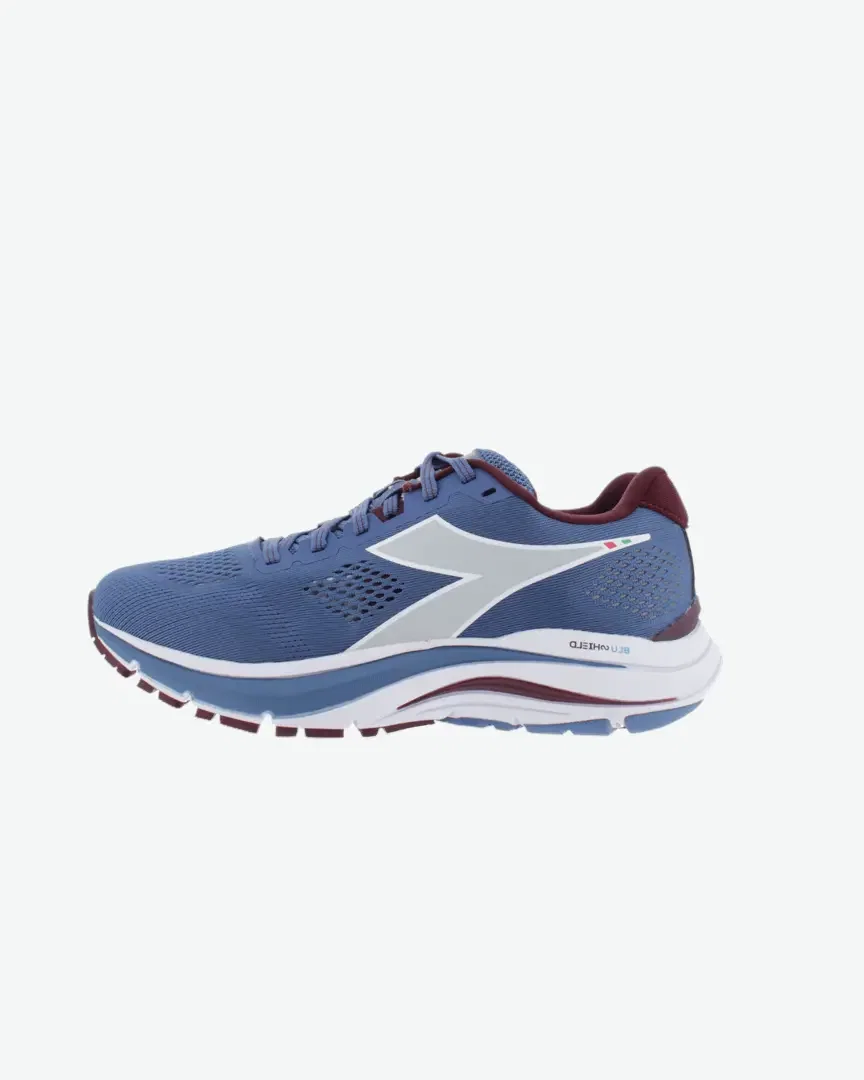Diadora Mythos Blushield 7 Vortic Mujer