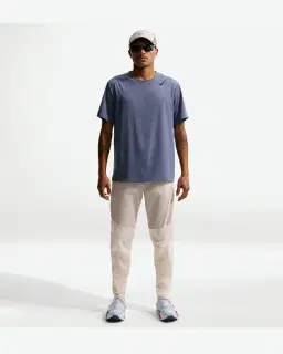 Pantalón Tejido Impermeable Nike Stride Hombre – 1/4