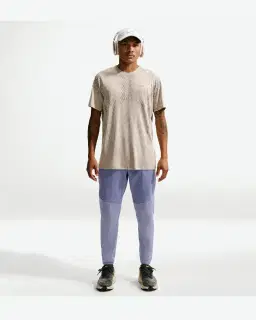 Pantalón Tejido Impermeable Nike Stride Hombre – 1/4