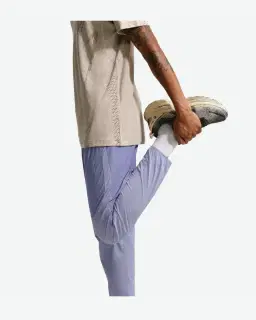 Pantalón Tejido Impermeable Nike Stride Hombre – 4/4
