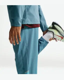 Pantalón Tejido Dri-Fit Nike Miler Hombre – 4/4