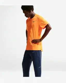 Pantalón Tejido Dri-Fit Nike Miler Hombre – 4/4