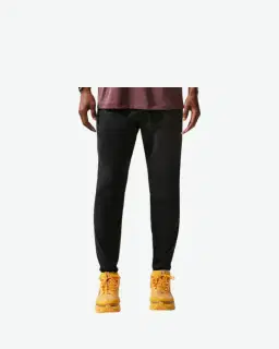 Pantalón Tejido Impermeable Nike Stride Hombre – 1/3