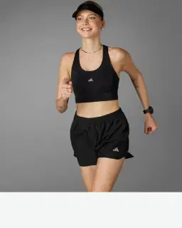 Corta Adidas Run It Mujer – 1/4