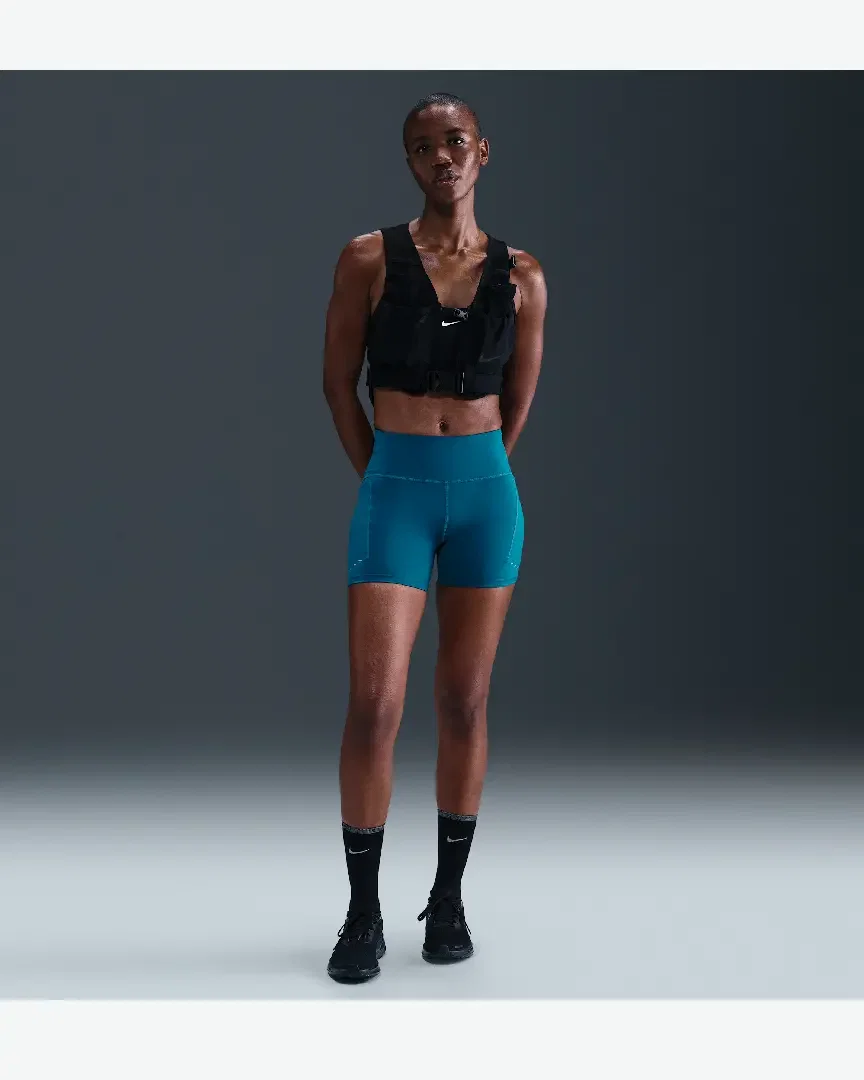 Pantalón corto ajustado de cintura alta con bolsillos 10 cm Nike Swift Mujer