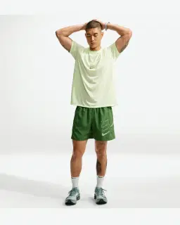 Short con pantalón interior integrado de 12,7 cm Dri-Fit Nike Miler Hombre – 1/4