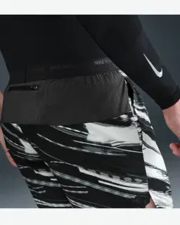 Short con shorts interiores integrados de 18 cm Dri-Fit Nike Stride Hombre – 3/4