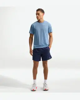Short con shorts interiores integrados de 18 cm Dri-Fit Nike Stride Hombre – 1/4
