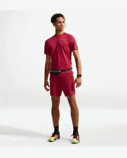 Short con shorts interiores integrados de 18 cm Dri-Fit Nike Stride Hombre – 1/4