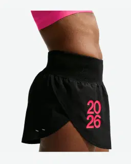 Short con pantalones cortos integrados de talle medio-alto Nike Flow After Dark Tour Mujer – 3/4