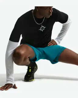 Camiseta con estampado Nike Dri-Fit Hombre – 1/4